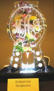 Oval monogram drink luge with fresh flowers
