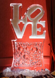 Love ice sculpture on bubble base, or the base could have wedding names