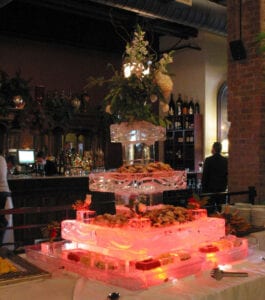 Three Tier Raw Bar Ice Sculpture. This is a very large seafood server it needs two six foot tables for the setup.