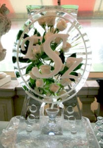 Oval Monogram luge with fresh white roses