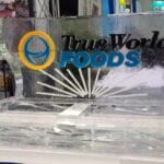 True Wold Foods logo w server